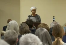 Representative Ilhan Omar addressing the public after the attack at her town hall.