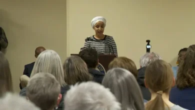Representative Ilhan Omar addressing the public after the attack at her town hall.