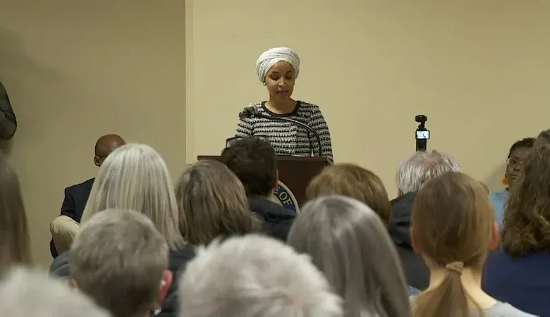 Representative Ilhan Omar addressing the public after the attack at her town hall.