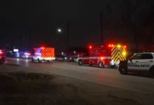 Houston Police Department cruiser responding to a deadly Houston home invasion on Lockwood Drive.