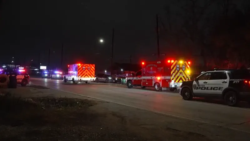 Houston Police Department cruiser responding to a deadly Houston home invasion on Lockwood Drive.