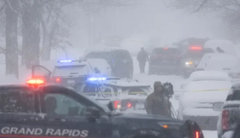 Grand Rapids Police cruiser responding to the triple shooting on Worden Street SE.