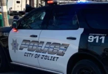 Joliet Police cruiser responding to the homicide scene on Garnsey Avenue.