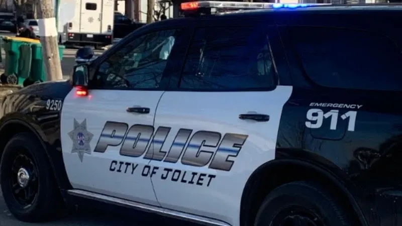 Joliet Police cruiser responding to the homicide scene on Garnsey Avenue.