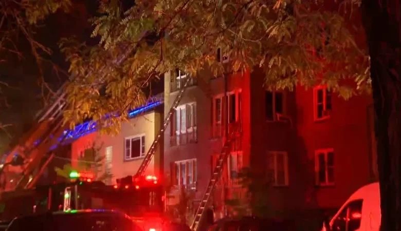 Chicago Fire Department trucks responding to the West Ridge apartment fire on Touhy Avenue.