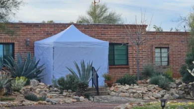 A white forensic tent erected at the Nancy Guthrie home during the abduction investigation.