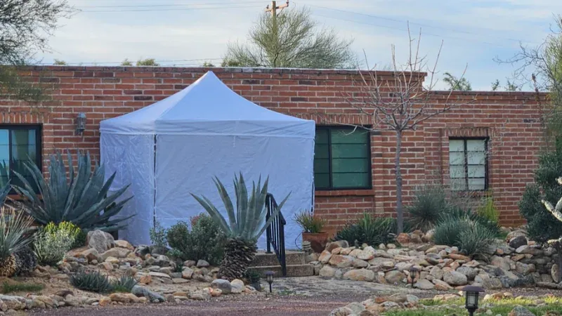 A white forensic tent erected at the Nancy Guthrie home during the abduction investigation.