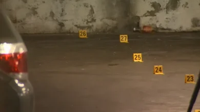 Seattle Police responding to the Pioneer Square shooting scene at night.