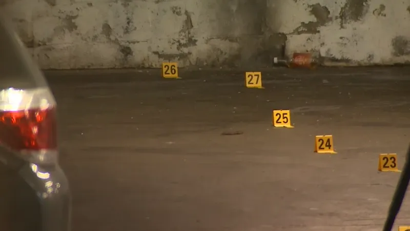 Seattle Police responding to the Pioneer Square shooting scene at night.