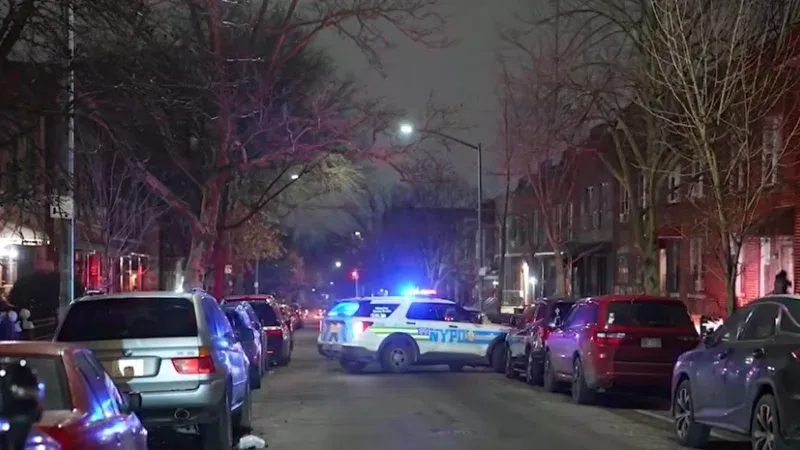 An NYPD cruiser arrives at the scene of the recent Sunset Park teen shooting in Brooklyn.