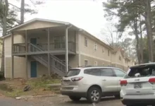 Atlanta police secure the residential perimeter following a tragic Atlanta fatal stabbing.