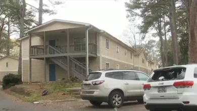 Atlanta police secure the residential perimeter following a tragic Atlanta fatal stabbing.