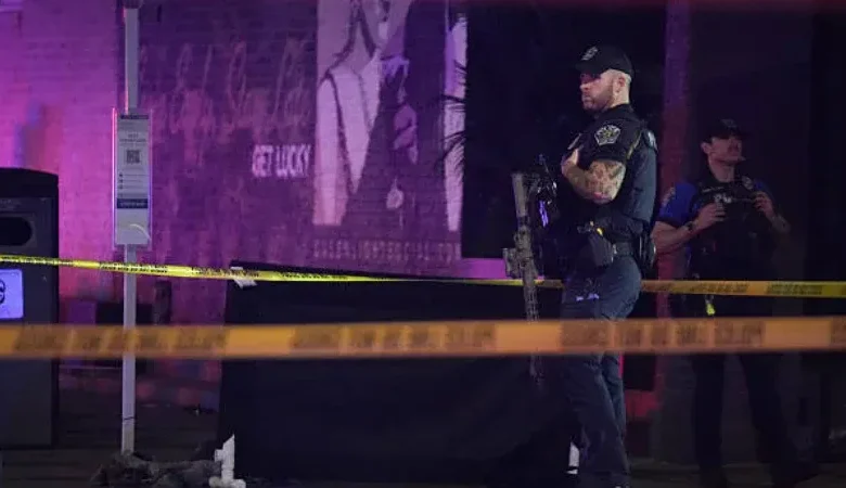 Law enforcement secures the scene of the fatal Estabrook Park shooting in Shorewood.