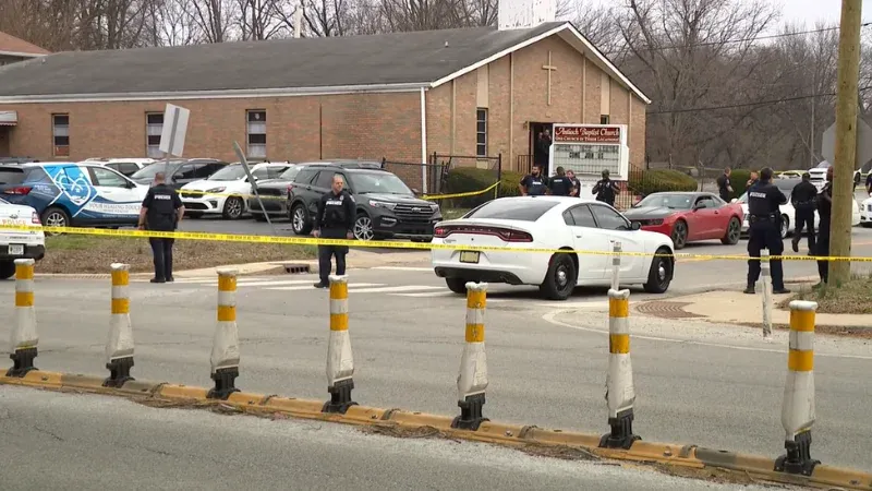 Detectives investigate the street after a deadly Indianapolis church shooting.