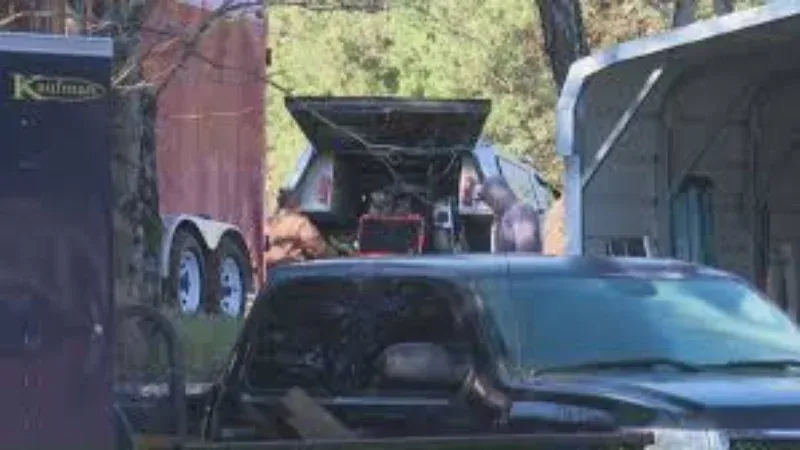 Fire crews survey the structural damage after a deadly Thomasville house fire.