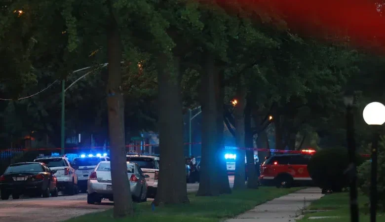 Three men shot in South Shore Chicago crime scene tape.