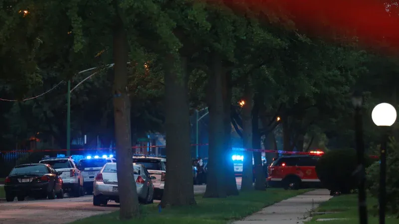 Three men shot in South Shore Chicago crime scene tape.