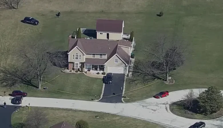 Three people found dead in Crete Township crime scene at night showing police tape