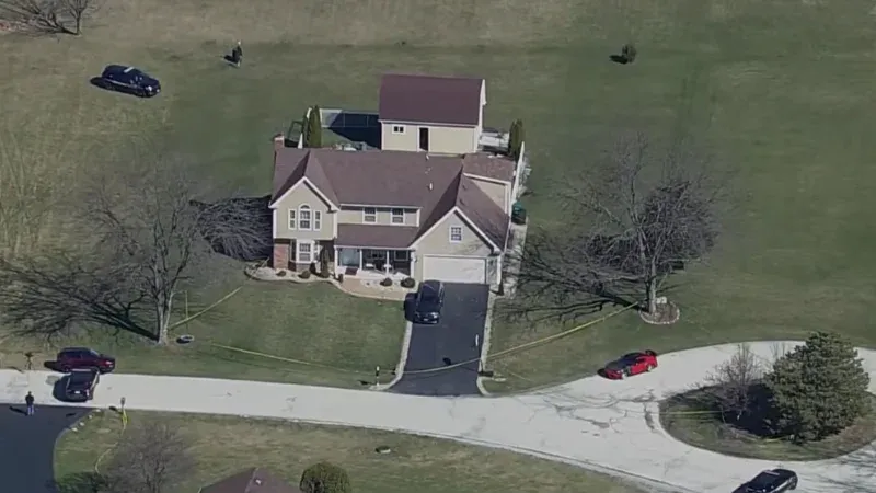 Three people found dead in Crete Township crime scene at night showing police tape