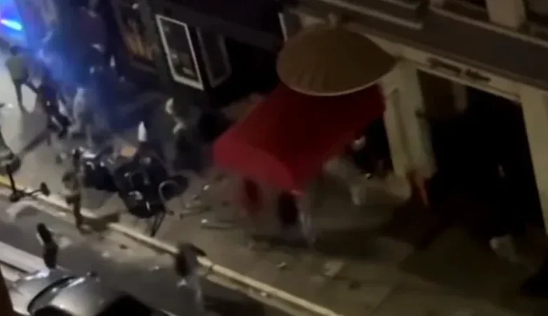 Police secure the downtown scene following the deadly Oakland bar shooting early Saturday.