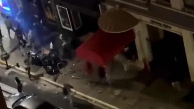 Police secure the downtown scene following the deadly Oakland bar shooting early Saturday.