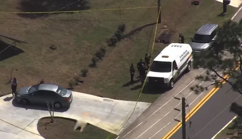 Detectives secured a shallow backyard grave during the Palm Coast infant death investigation.