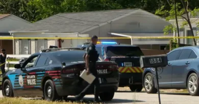 Atlanta Police Department investigators on Lathrop Street SE in Southeast Atlanta.