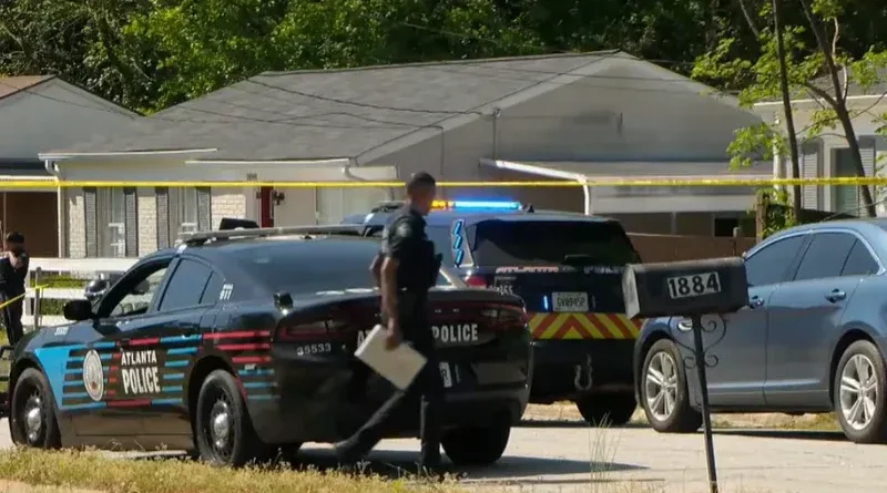 Atlanta Police Department investigators on Lathrop Street SE in Southeast Atlanta.