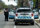 Chicago Police vehicles and crime scene tape near a bus stop on South Stony Island Avenue.