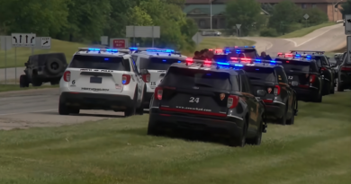 A street near a park in Toledo, Ohio, closed by police tape following a mass shooting.