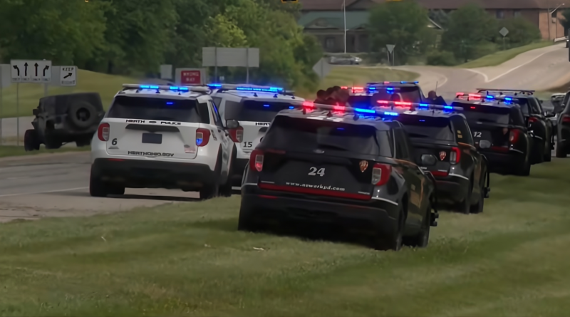 A street near a park in Toledo, Ohio, closed by police tape following a mass shooting.