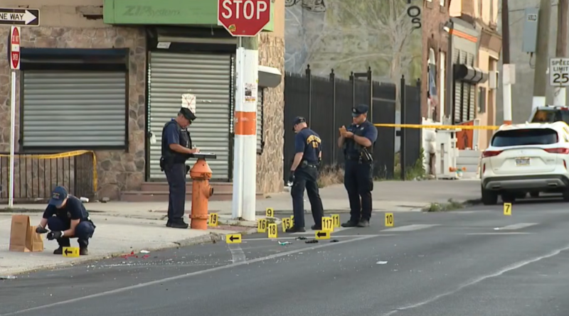 Two men were killed and two others were injured during a quadruple shooting outside a lounge in Philadelphia's Fairhill neighborhood on Sunday.